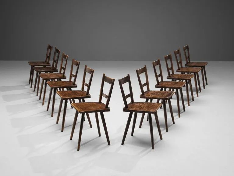 Set of Twelve French Pastoral Dining Chairs in Stained Wood